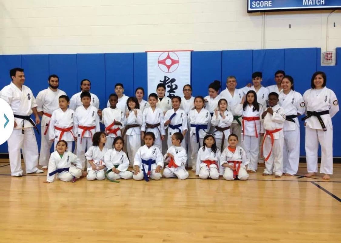 Family karate students group photo at US Bushido